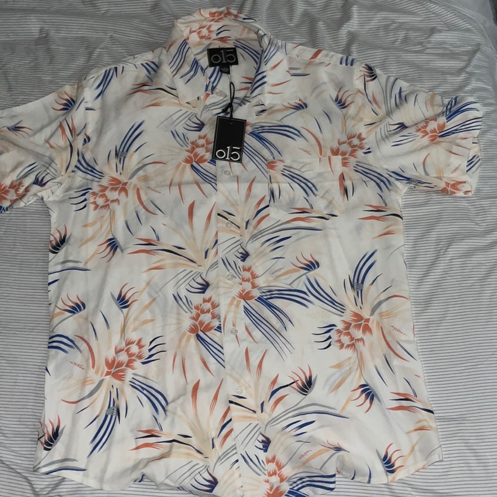 O1c button down shirt, vibrant colors from royal blue to a pretty coral .